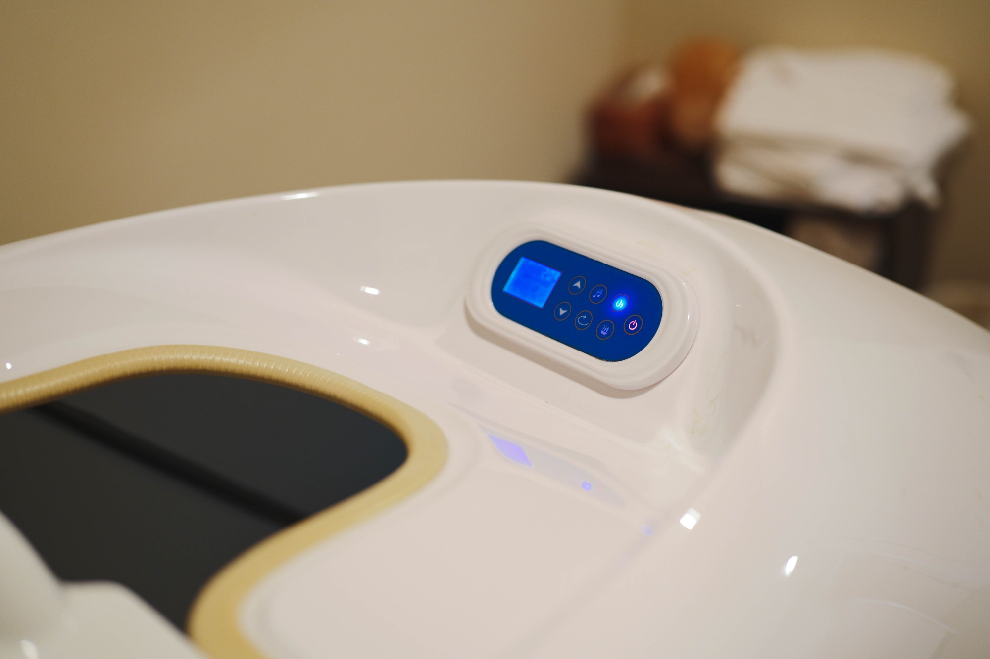 Digital control panel on the ozone steam sauna unit at IHP — programmable session settings with blue LCD display