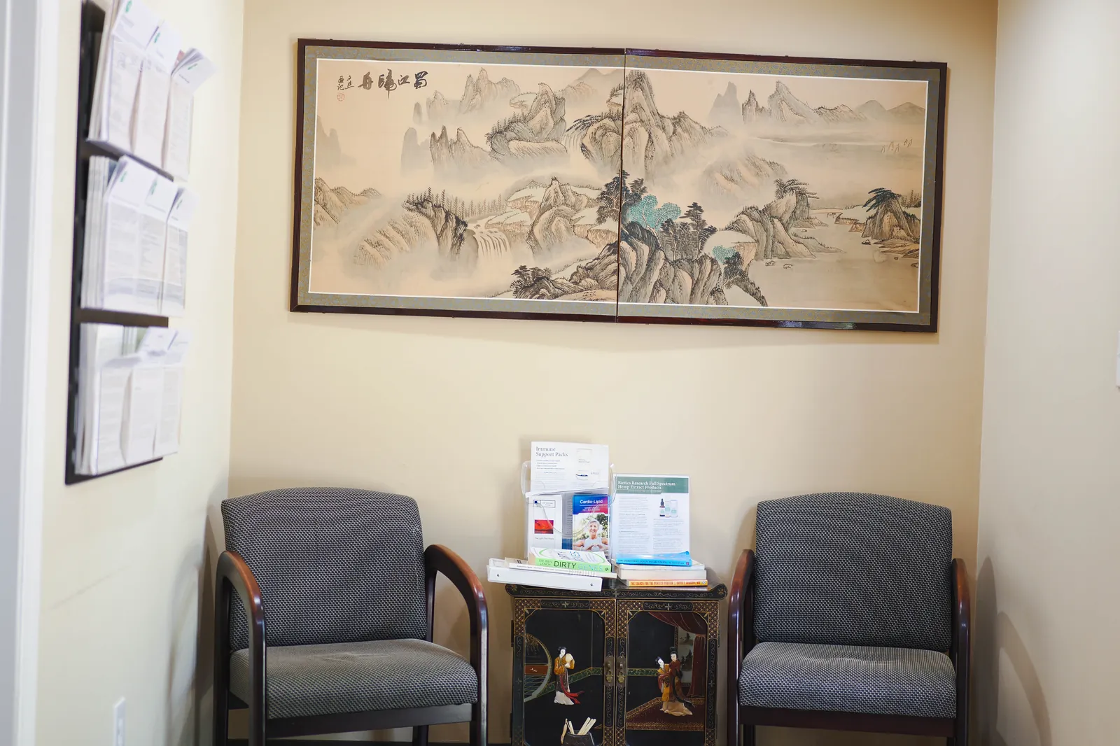 Waiting area at Integrative Health Partners — peaceful setting with traditional Chinese landscape art
